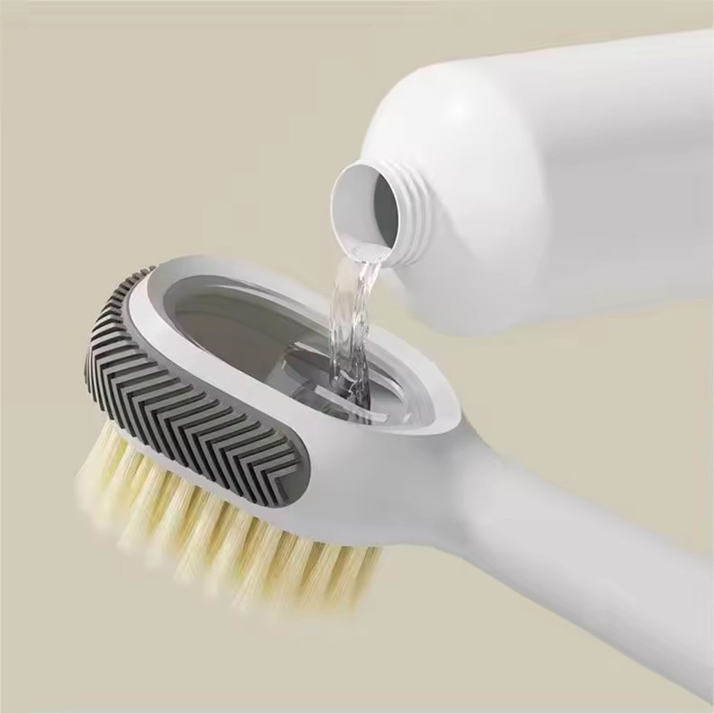 Press design cleaning brush