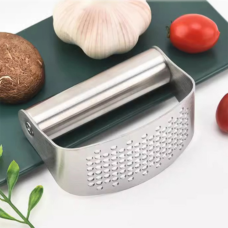 Garlic press with handle Garlic press with handle